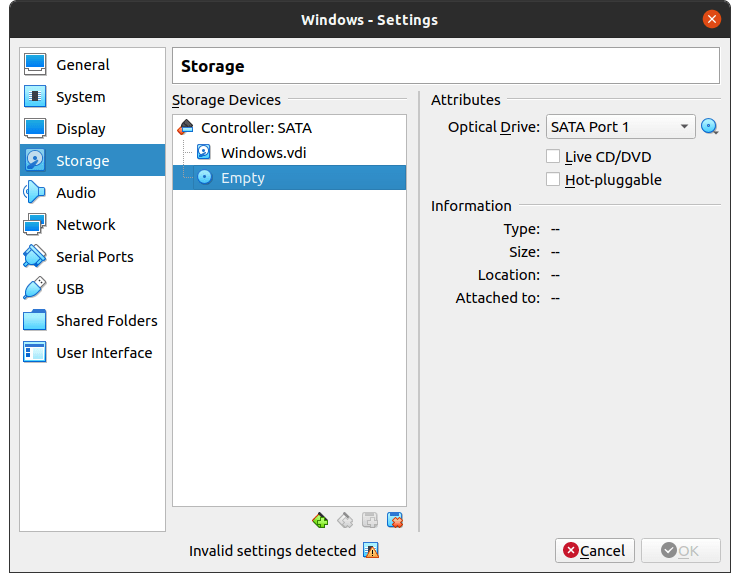 Click on “Storage” and choose “Empty” and then click on the disk icon located beside “Optical Drive
