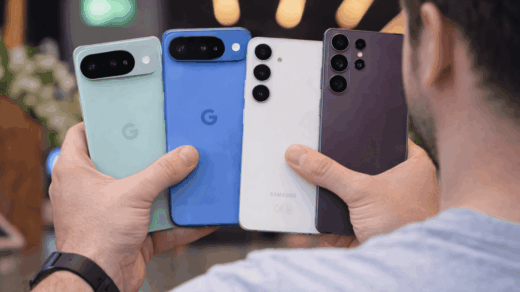 Holding four smartphones in hand