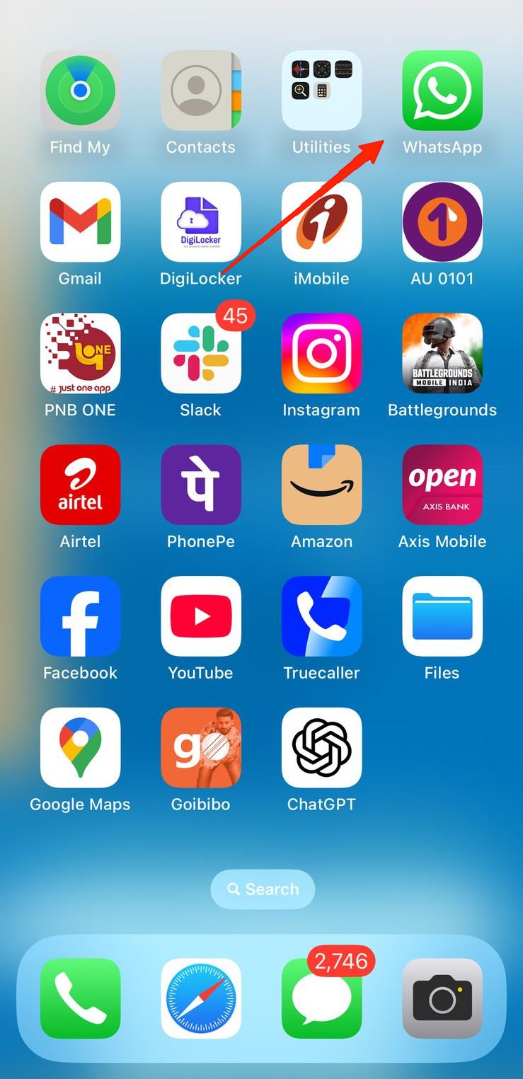 Launch WhatsApp, open any chat, and tap on the emoji icon.