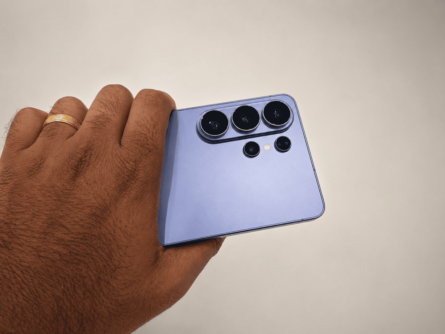 Man Holding Back of S26 Ultra Pale Blue Color