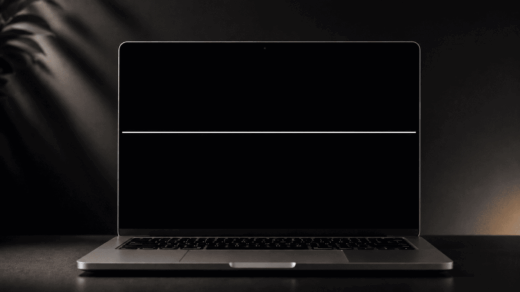 Minimalist laptop with soft lighting with a white line on the Mac screen